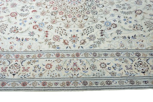 Corner detail of New Nain rug showing border pattern and Wool pile
