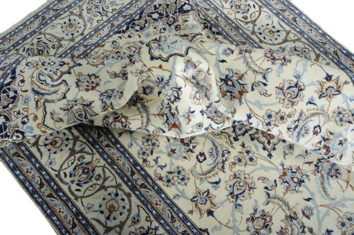 Surface texture of New Nain rug with natural Wool and intricate pattern