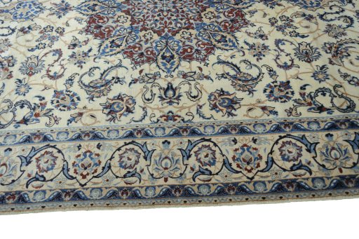Corner detail of New Nain rug showing border pattern and Wool pile