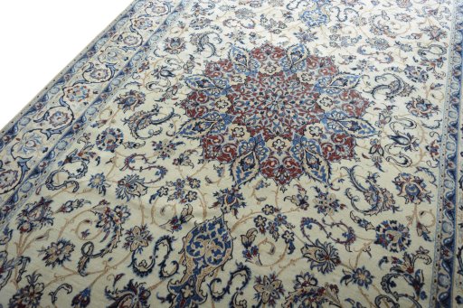Backside of handmade New Nain rug showing knot structure and weave density