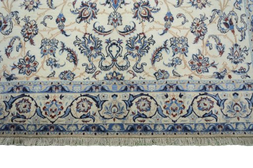 Full view of New Nain rug from Iran / Persia, 327 × 205 cm in Beige tones