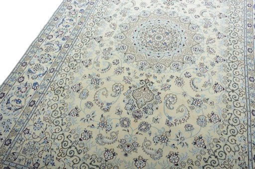 Backside of handmade New Nain rug showing knot structure and weave density