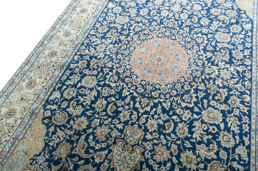 Backside of handmade 1970s Nain rug showing knot structure and weave density