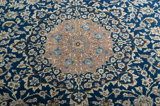 Central medallion detail of 1970s Nain rug from Iran / Persia
