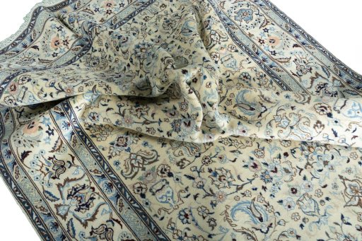 Surface texture of New Nain rug with natural Wool and intricate pattern