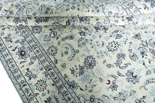 Close-up detail of New Nain rug from Iran / Persia showing Wool weave