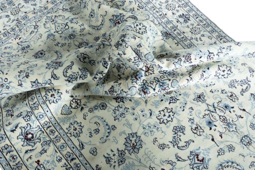 Surface texture of New Nain rug with natural Wool and intricate pattern