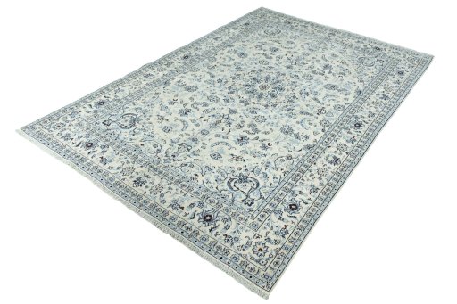 Corner detail of New Nain rug showing border pattern and Wool pile