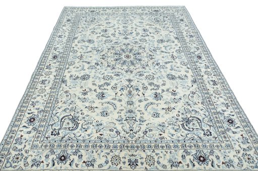 Surface texture of New Nain rug with natural Wool and intricate pattern