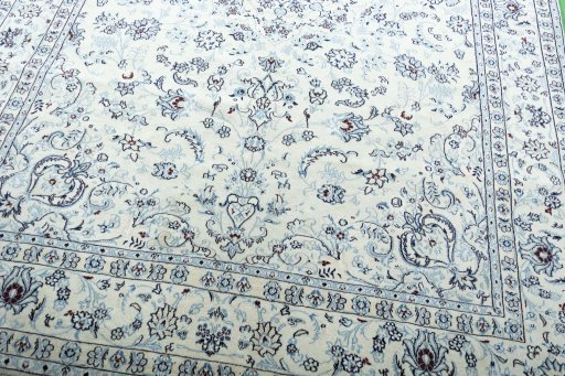 Close-up detail of New Nain rug from Iran / Persia showing Wool weave