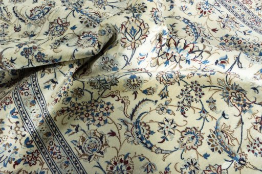 Surface texture of New Nain rug with natural Wool and intricate pattern