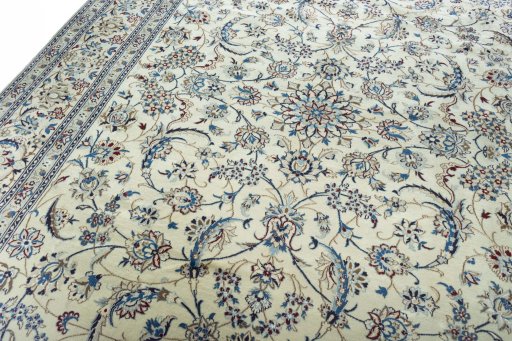 Backside of handmade New Nain rug showing knot structure and weave density