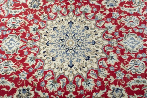 Central medallion detail of New Nain rug from Iran / Persia