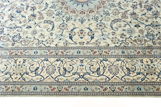 Corner detail of New Nain rug showing border pattern and Wool pile