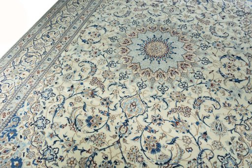 Backside of handmade New Nain rug showing knot structure and weave density