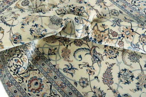 Close-up detail of New Nain rug from Iran / Persia showing Wool weave