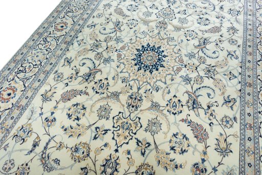 Backside of handmade New Nain rug showing knot structure and weave density