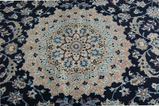 Central medallion detail of New Nain rug from Iran / Persia