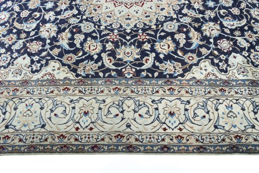 Corner detail of New Nain rug showing border pattern and Wool pile