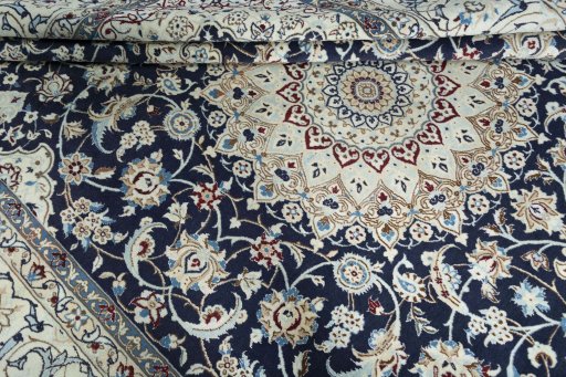 Close-up detail of New Nain rug from Iran / Persia showing Wool weave