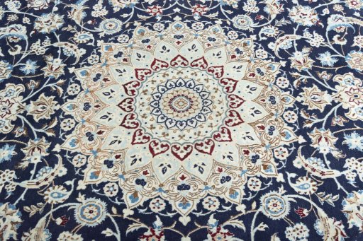 Central medallion detail of New Nain rug from Iran / Persia