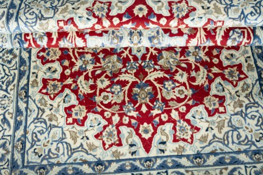 Close-up detail of 2000s Nain rug from Iran / Persia showing Wool weave