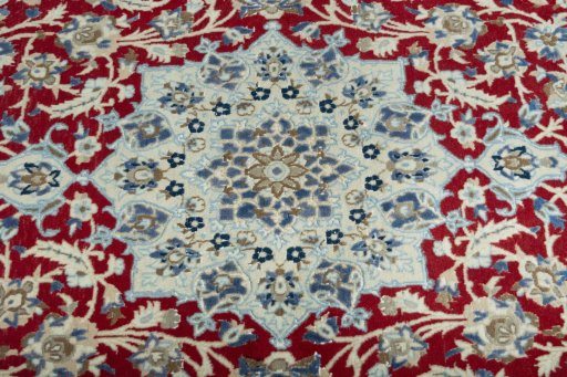 Central medallion detail of 2000s Nain rug from Iran / Persia