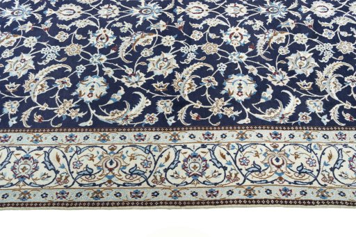 Corner detail of New Nain rug showing border pattern and Wool pile