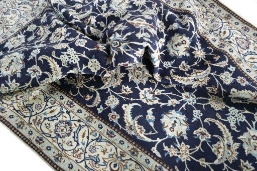 Surface texture of New Nain rug with natural Wool and intricate pattern