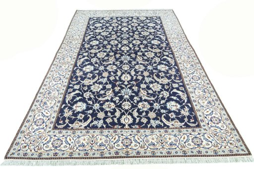 Surface texture of New Nain rug with natural Wool and intricate pattern