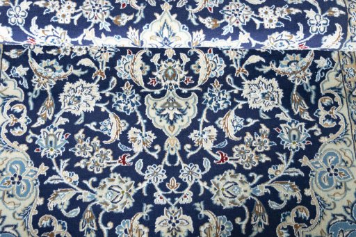 Close-up detail of 2000s Nain rug from Iran / Persia showing Wool weave