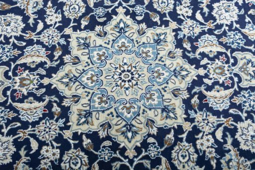 Central medallion detail of 2000s Nain rug from Iran / Persia