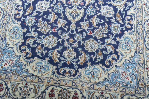 Close-up detail of 2000s Nain rug from Iran / Persia showing Wool weave