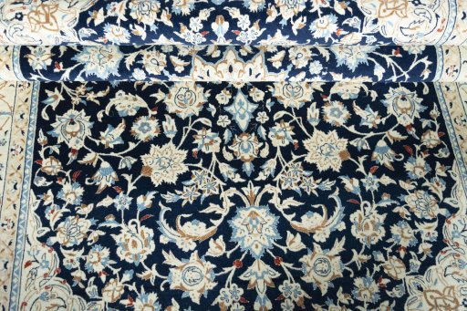 Close-up detail of 2000s Nain rug from Iran / Persia showing Wool weave