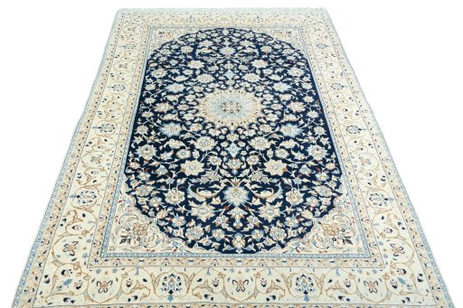 Surface texture of 2000s Nain rug with natural Wool and intricate pattern