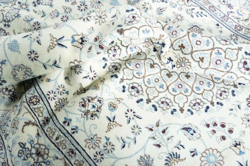 Surface texture of New Nain rug with natural Wool and intricate pattern