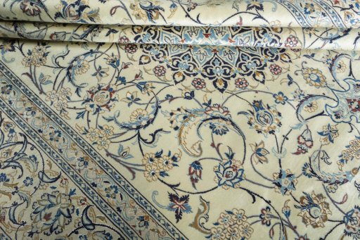 Close-up detail of New Nain rug from Iran / Persia showing Wool weave