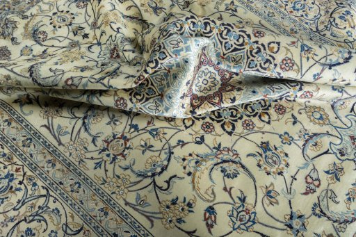 Surface texture of New Nain rug with natural Wool and intricate pattern