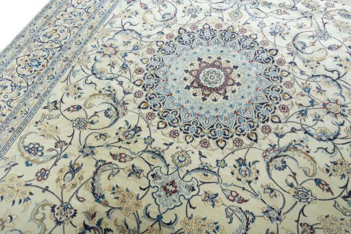 Backside of handmade New Nain rug showing knot structure and weave density