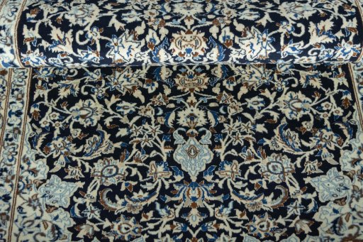Close-up detail of 2000s Nain rug from Iran / Persia showing Wool weave