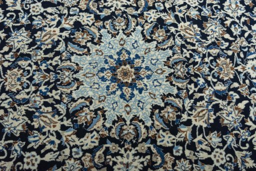 Central medallion detail of 2000s Nain rug from Iran / Persia