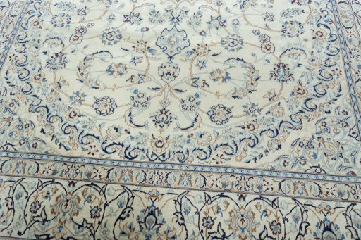 Corner detail of New Nain rug showing border pattern and Wool pile