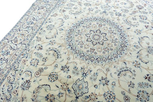 Backside of handmade New Nain rug showing knot structure and weave density