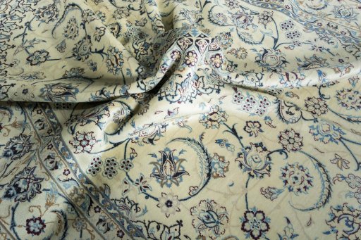 Surface texture of New Nain rug with natural Wool and intricate pattern