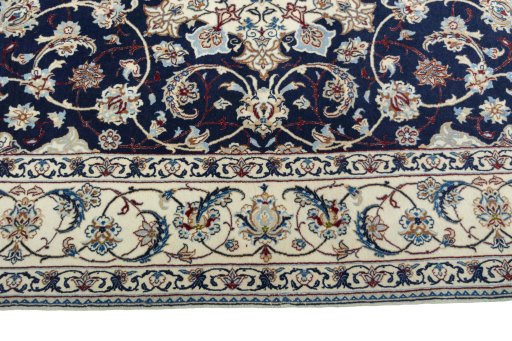 Corner detail of New Nain rug showing border pattern and Cork pile