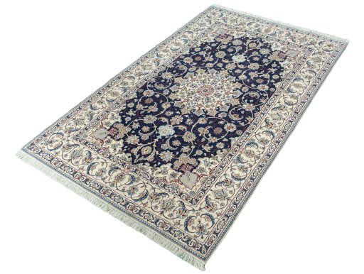 Corner detail of New Nain rug showing border pattern and Cork pile