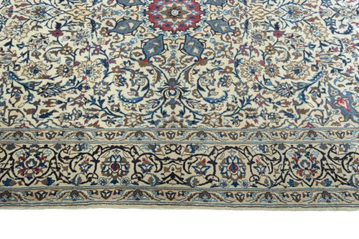 Corner detail of 2000s Nain rug showing border pattern and Wool pile