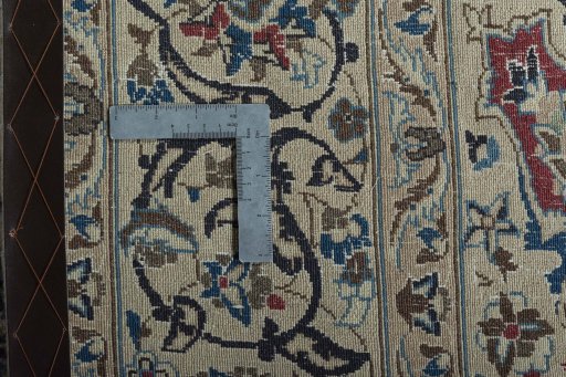 Backside of handmade 2000s Nain rug showing knot structure and weave density