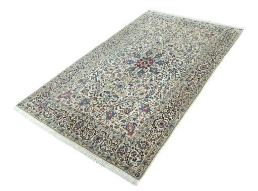Corner detail of 2000s Nain rug showing border pattern and Wool pile