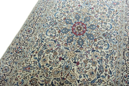 Backside of handmade 2000s Nain rug showing knot structure and weave density